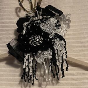 Elegant Black and White Floral Brooch